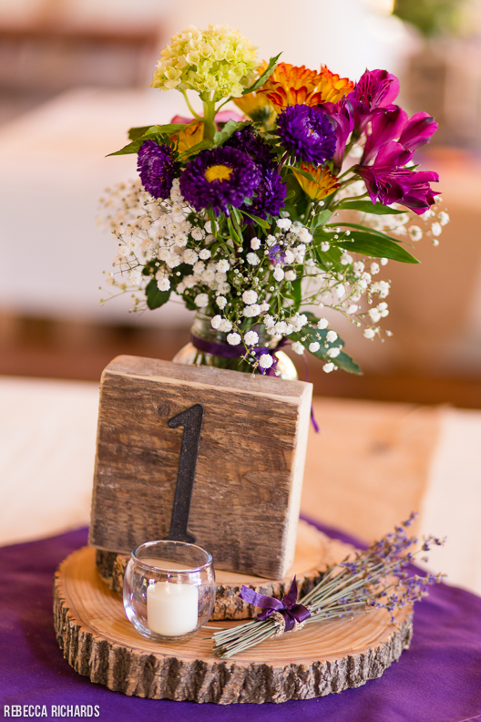 Rustic table numbers with wood and wildflowers. Rustic wedding.