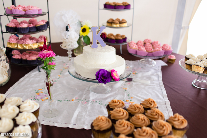 Homemade wedding cake and wedding cupcake buffet