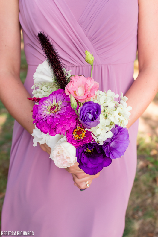 Lilac bridesmaid dress and shades of purple bridesmaid bouquet. Colorful!