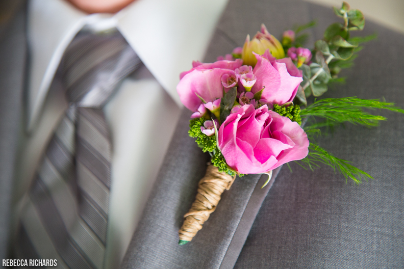 Pink and green boutonniere. 