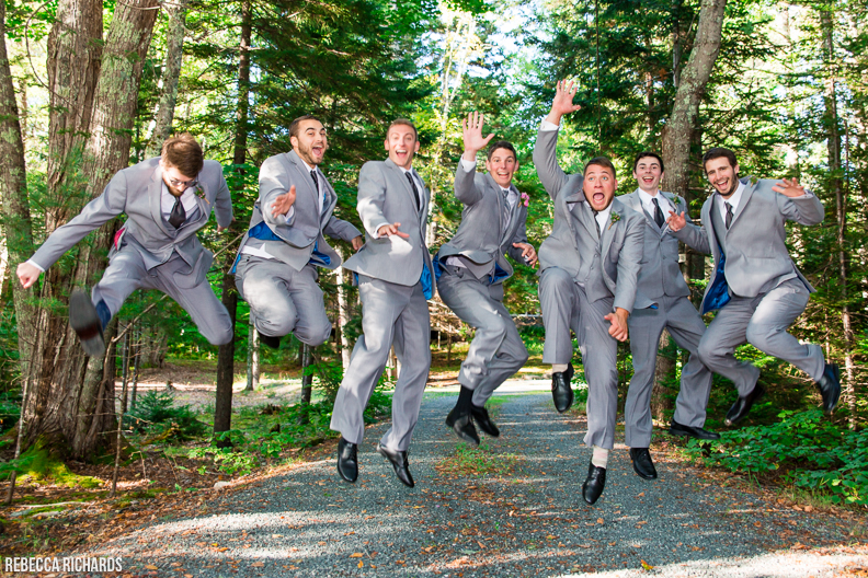 Jumping groomsmen. Wedding at the Causeway Club in Southwest Harbor. Maine wedding photographer. 