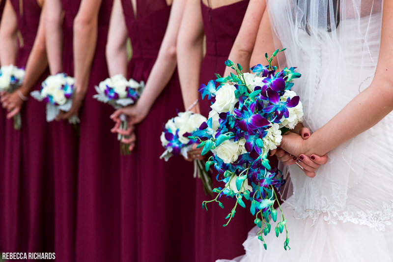 Burgundy and cobalt blue wedding colors for fall wedding | bride and bridesmaid flower bouquets